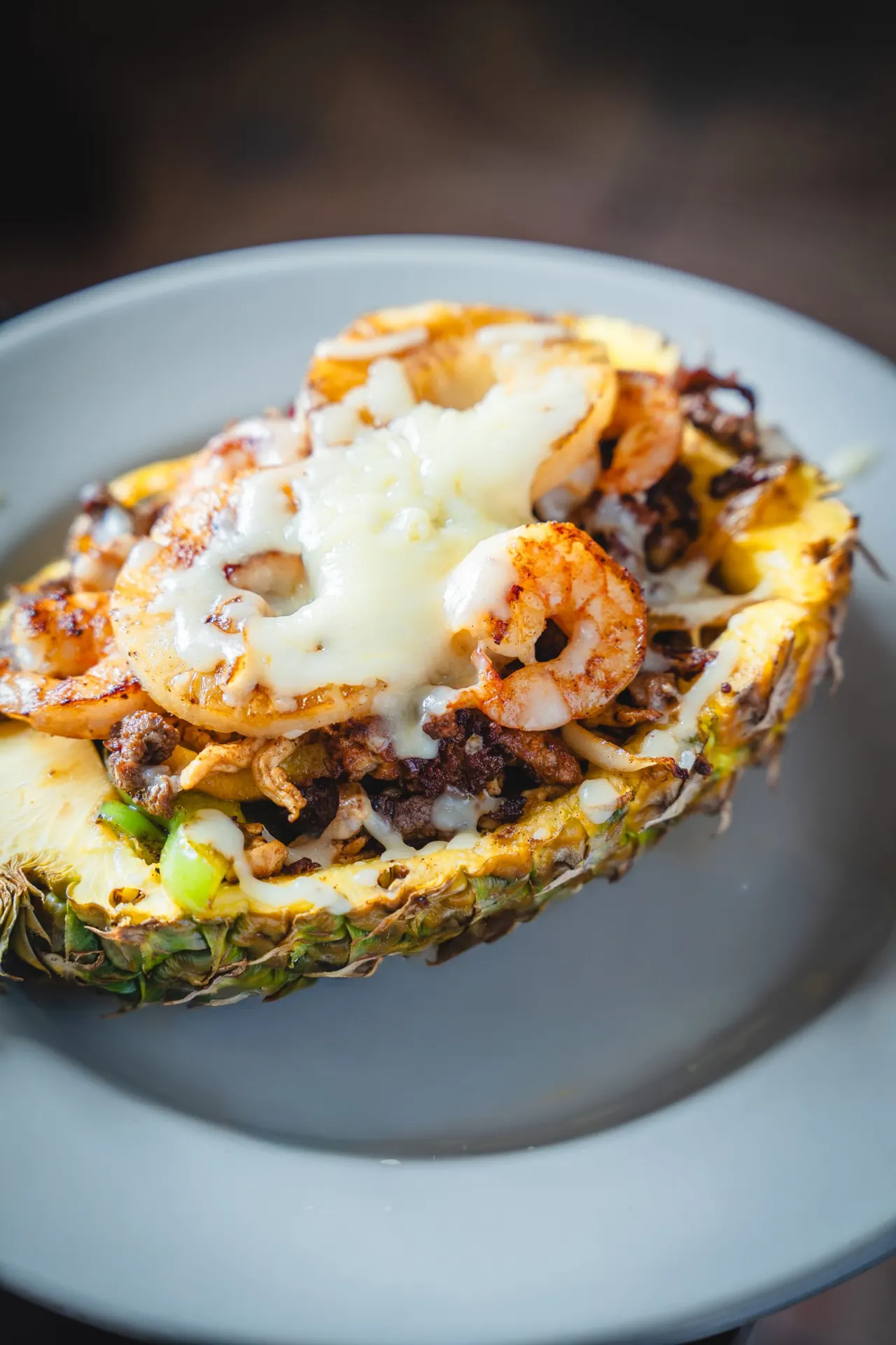 Seafood in a carved pineapple
