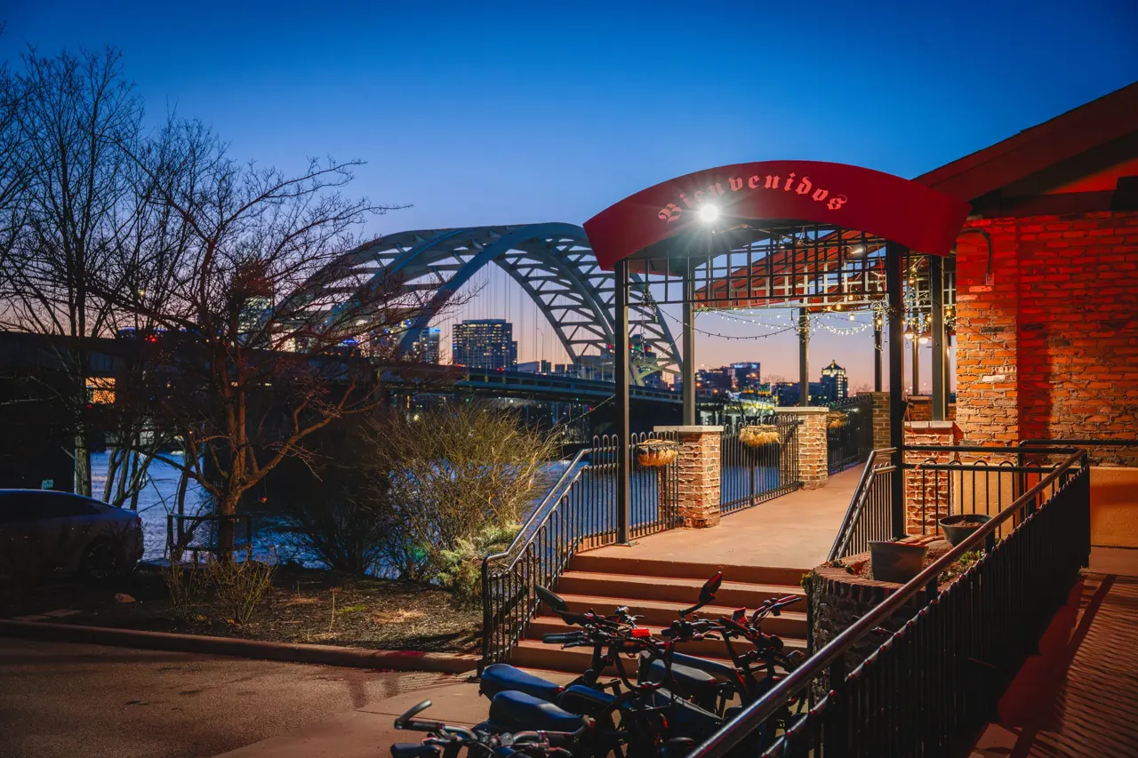 The riverfront patio at dusk